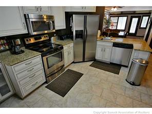 1944 Soda Ridge Road, Unit 229 Keystone, CO 80435 - Photo 14 of 25 a kitchen with a sink appliances and cabinets