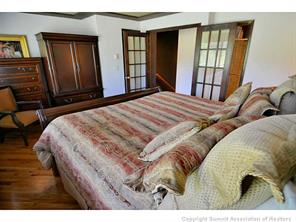 1944 Soda Ridge Road, Unit 229 Keystone, CO 80435 - Photo 5 of 25 a bed sitting in a bedroom next to a window