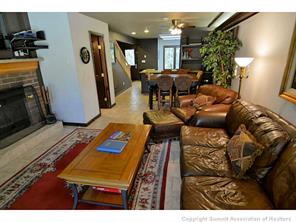 1944 Soda Ridge Road, Unit 229 Keystone, CO 80435 - Photo 9 of 25 a living room with furniture and a flat screen tv