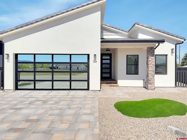 a view of a house with a swimming pool
