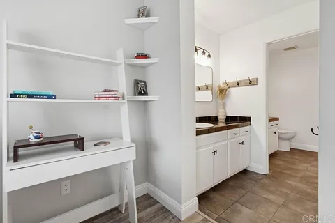 a hallway with cabinets