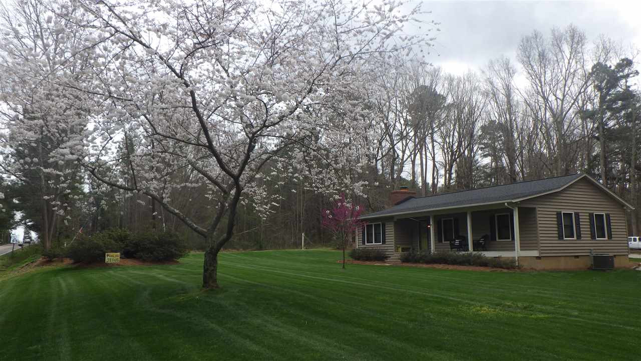 7434 Riley Hill Road Zebulon, NC 27597 - Photo 2 of 23 Another view of this lovely home! What a setting from your front porch!! Exterior Front