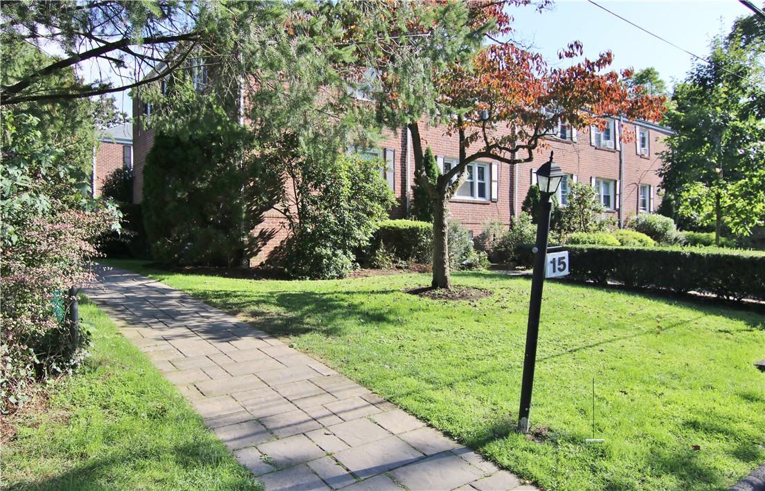 15 Chestnut Street, Unit 1A Rye, NY 10580 - Photo 1 of 1 15 Chestnut Street. Walkway to Courtyard in Middle of Garden