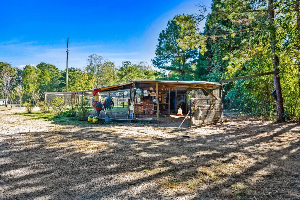 1189 Paul Harris Road Dallas, GA 30157 - Photo 18 of 44 a view of a house with backyard and sitting area
