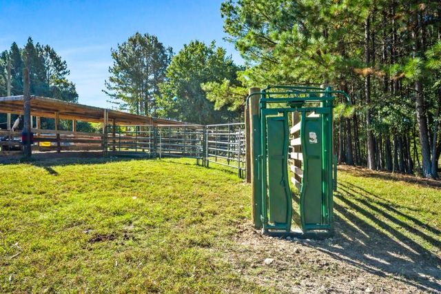 a view of an ocean and a yard