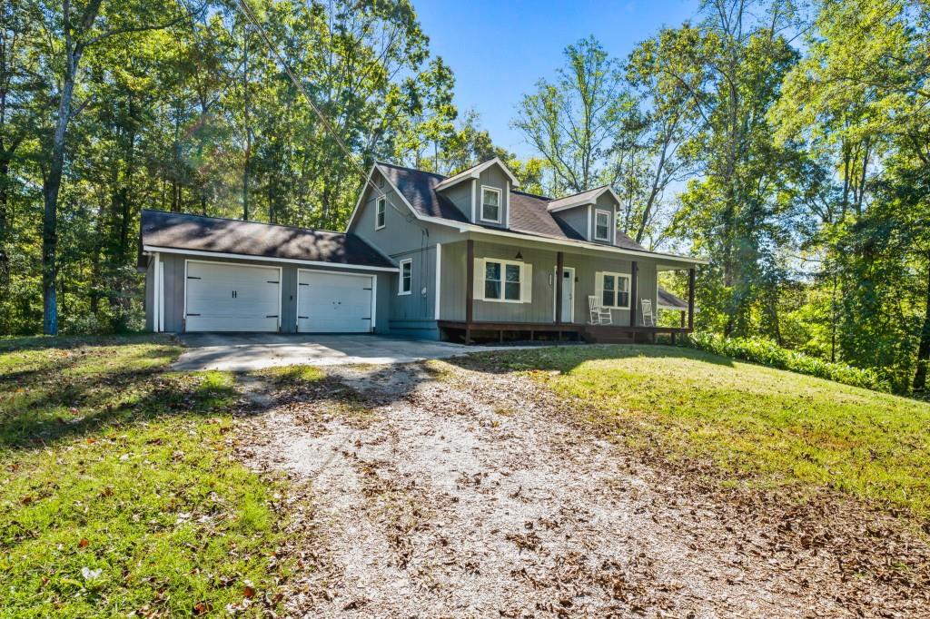 1189 Paul Harris Road Dallas, GA 30157 - Photo 27 of 44 a view of a house with a yard