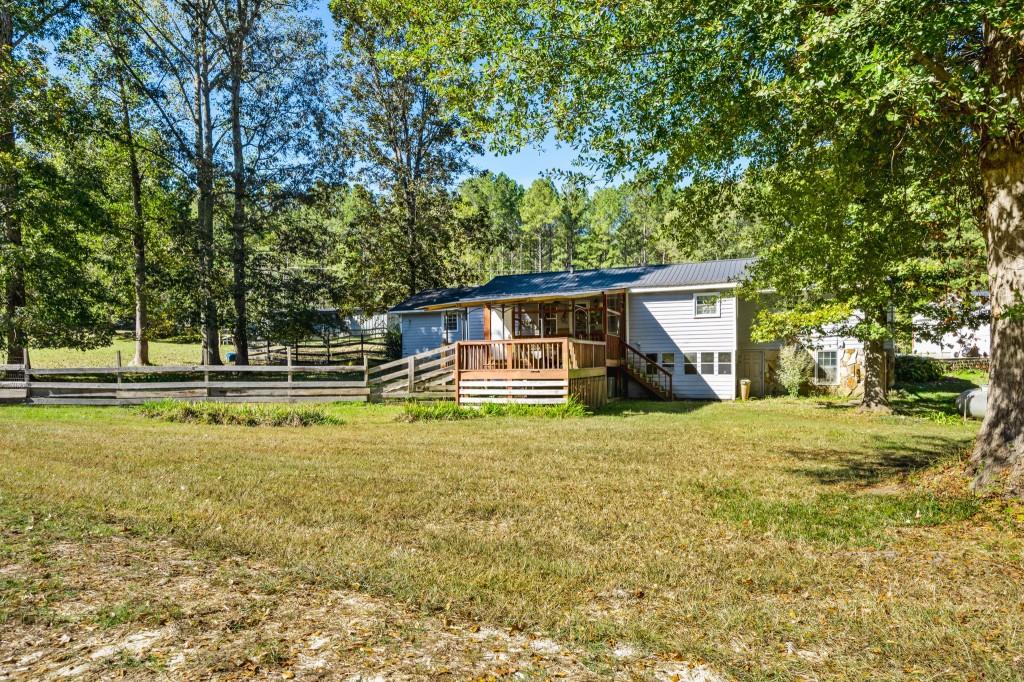 1189 Paul Harris Road Dallas, GA 30157 - Photo 37 of 44 a front view of a house with a yard