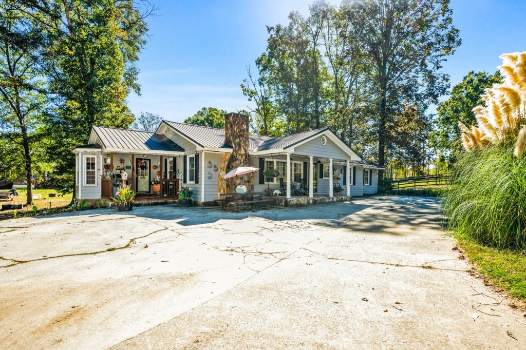 1189 Paul Harris Road Dallas, GA 30157 - Photo 41 of 44 a front view of a house with a yard