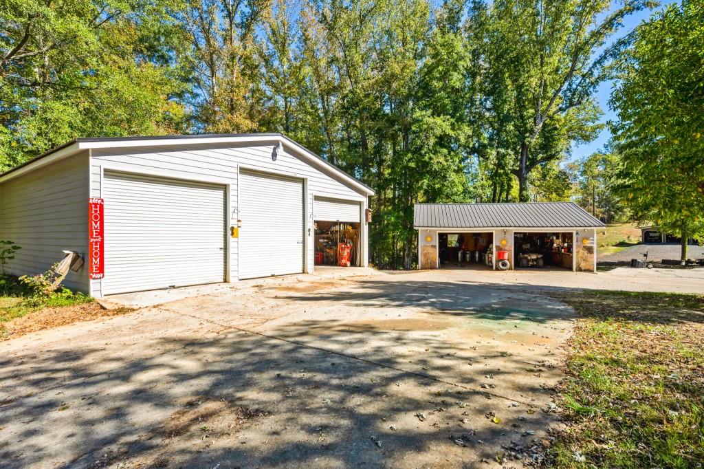 1189 Paul Harris Road Dallas, GA 30157 - Photo 42 of 44 a view of a house with a yard