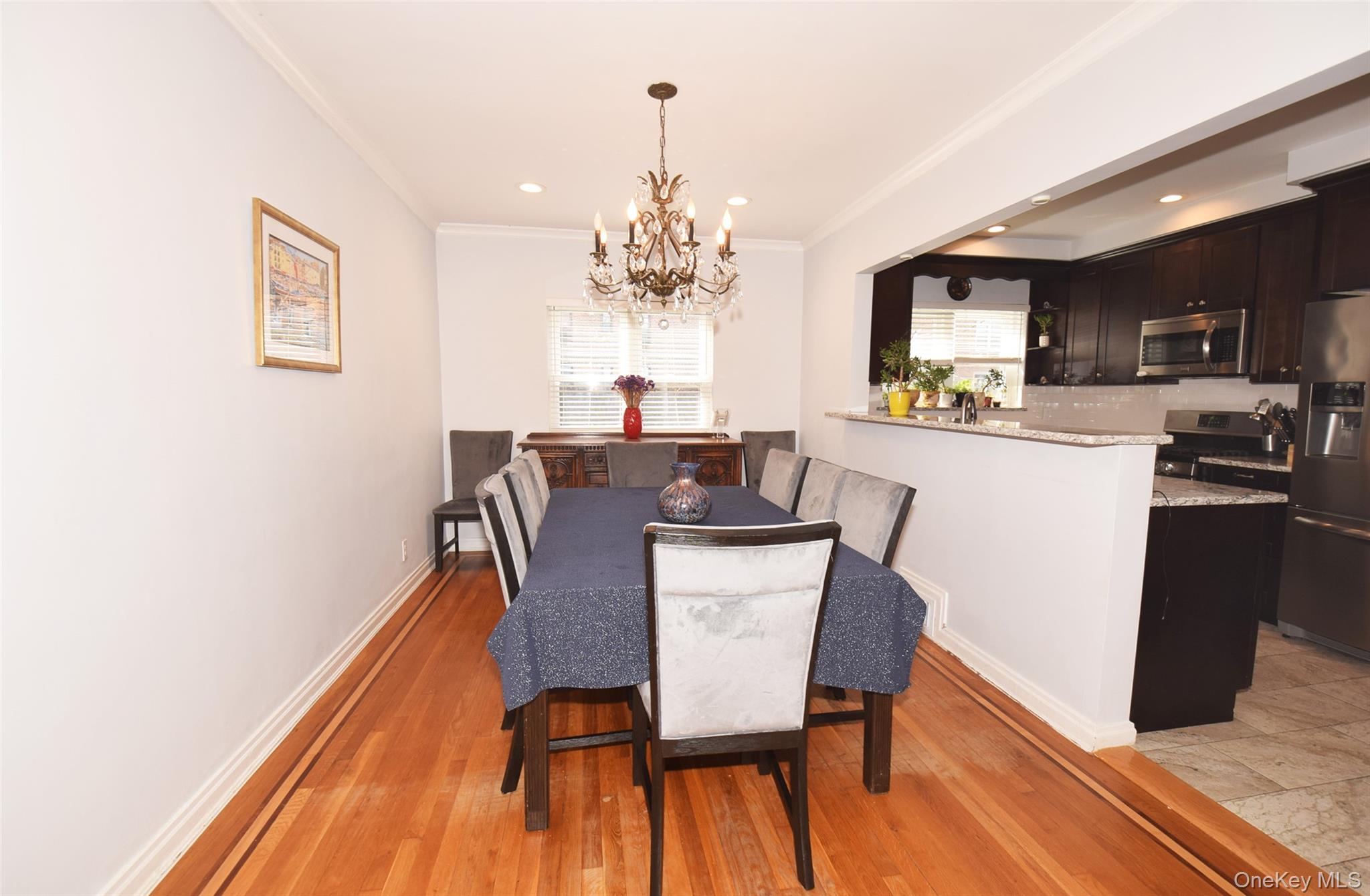 105-48 65th Road Queens, NY 11375 - Photo 5 of 17 a dining room with furniture and window