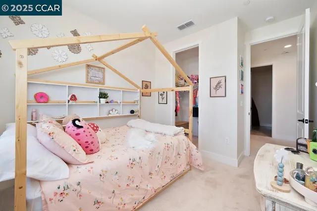 a bed room with a bed and a bed