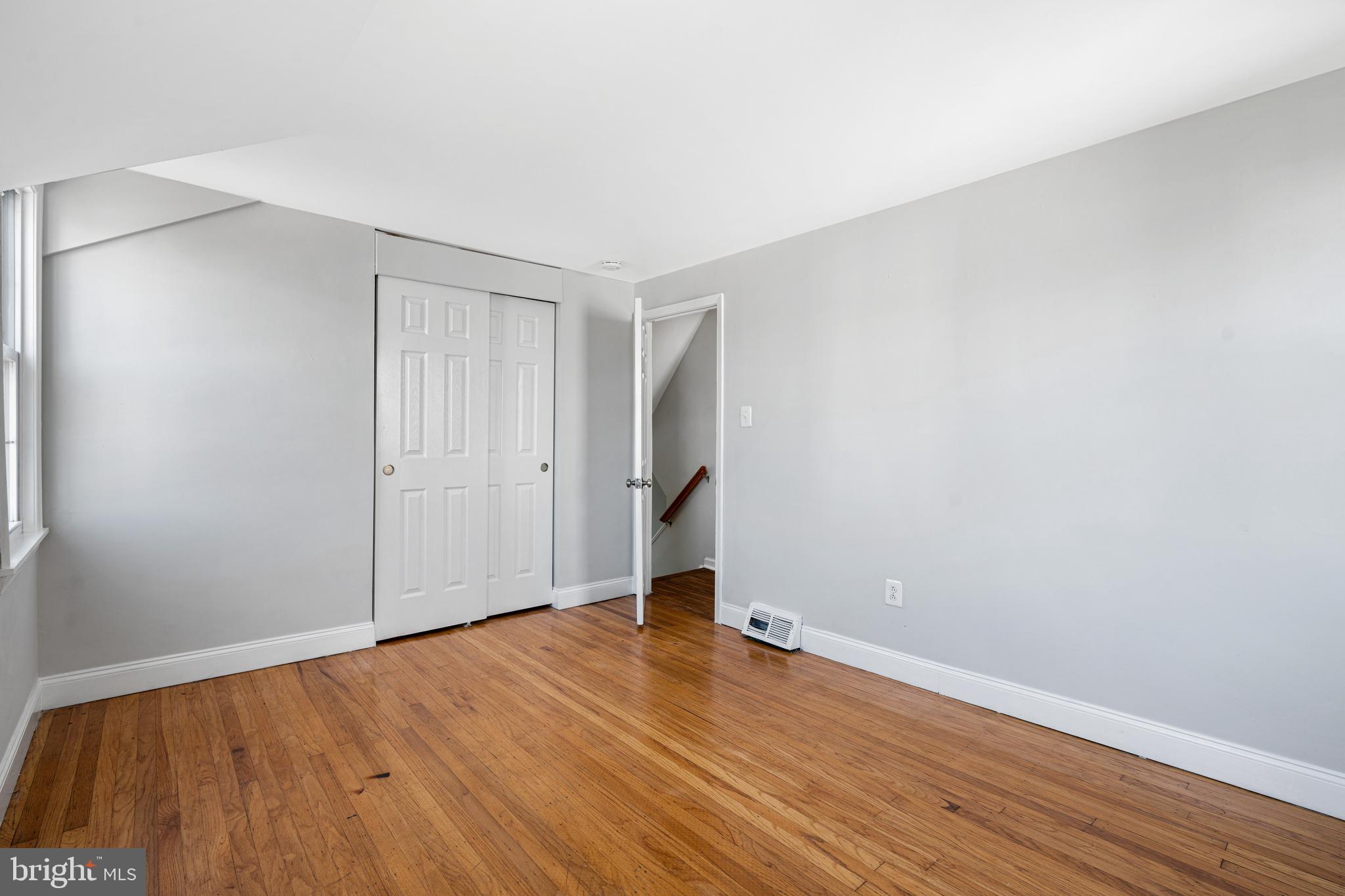 1344 Sunset Street Marcus Hook, PA 19061 - Photo 12 of 22 a view of empty room with wooden floor