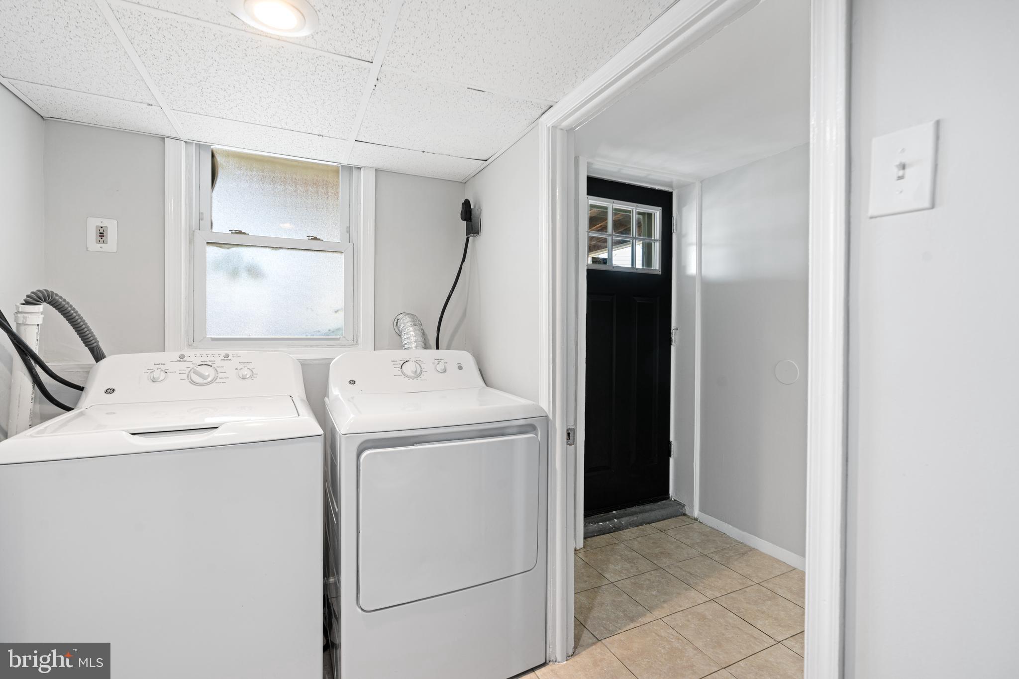 1344 Sunset Street Marcus Hook, PA 19061 - Photo 20 of 22 a utility room with dryer and washer