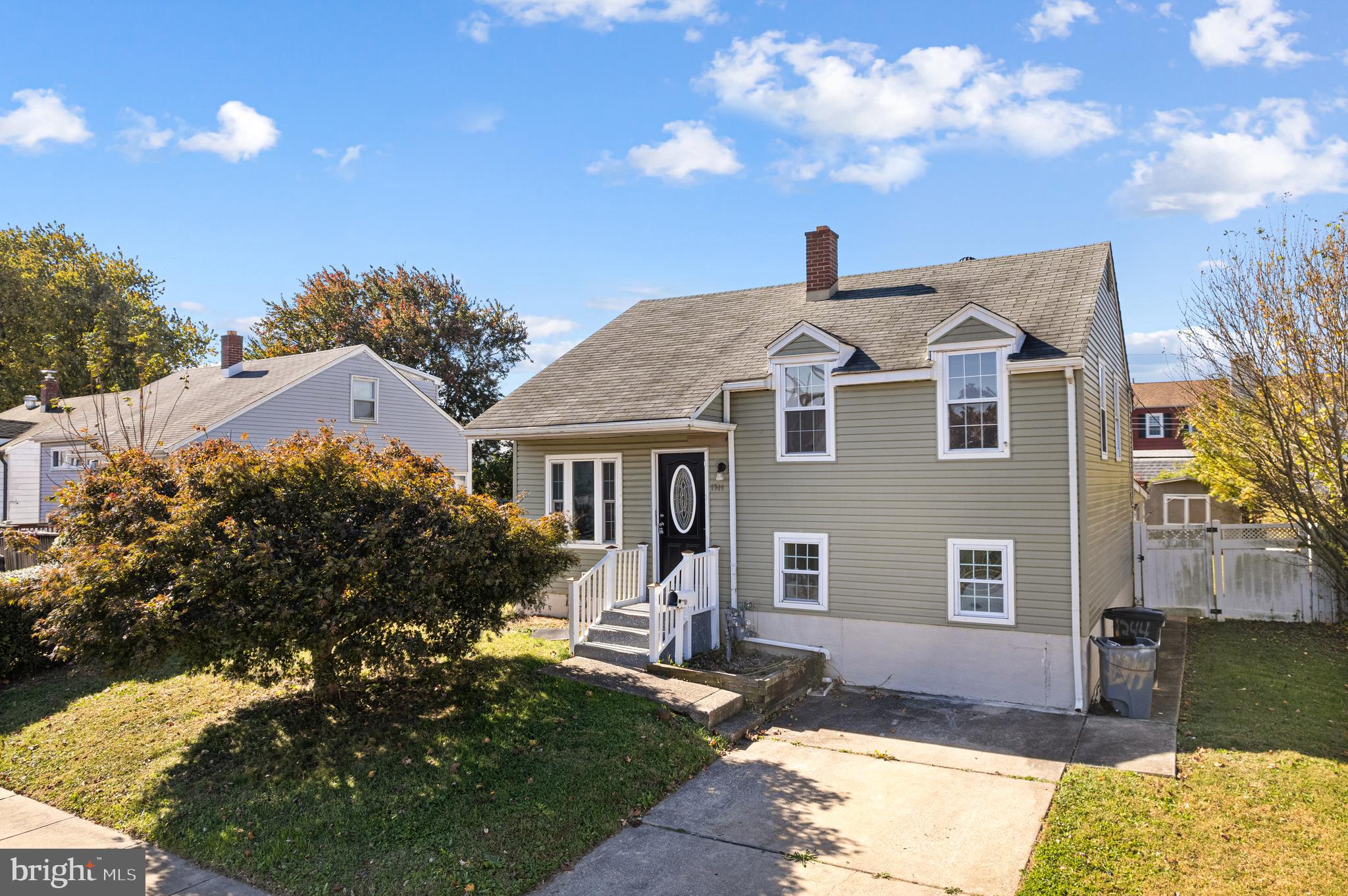 1344 Sunset Street Marcus Hook, PA 19061 - Photo 2 of 22 a front view of a house with a yard
