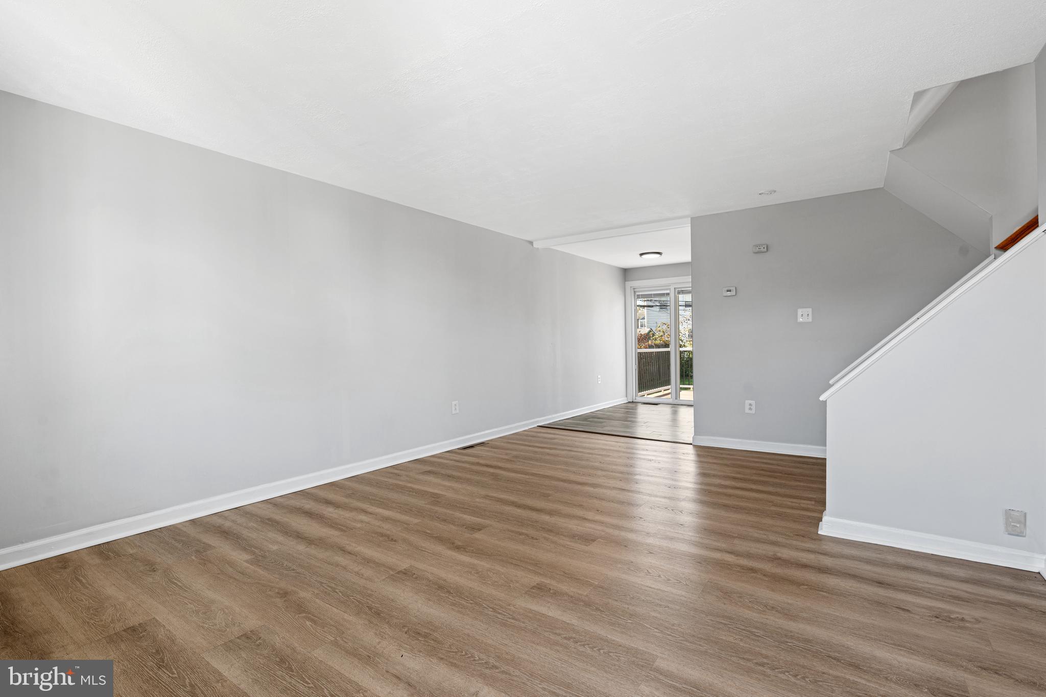 1344 Sunset Street Marcus Hook, PA 19061 - Photo 3 of 22 a view of empty room with wooden floor