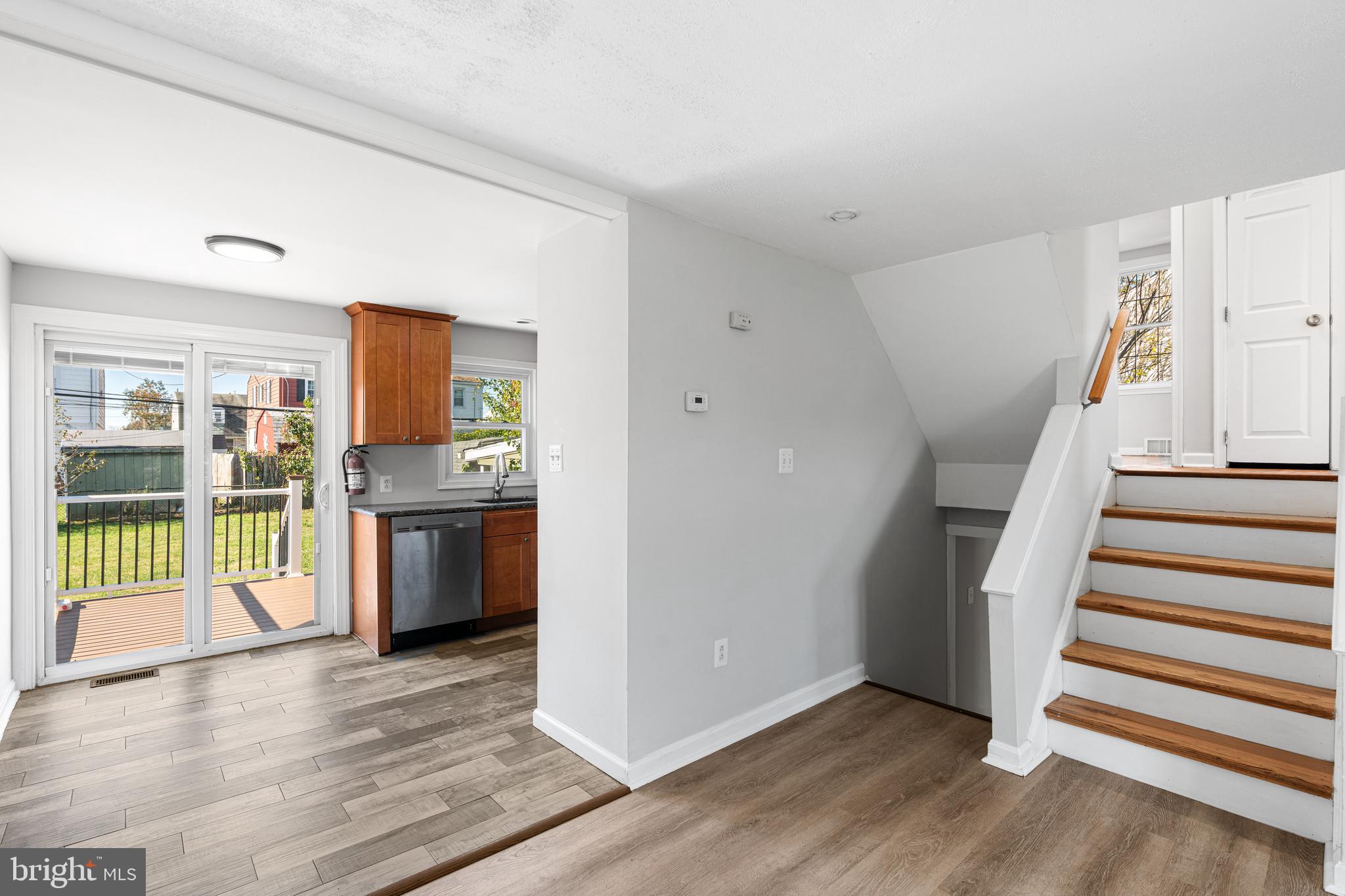 1344 Sunset Street Marcus Hook, PA 19061 - Photo 5 of 22 a view of a kitchen with wooden floor and electronic appliances