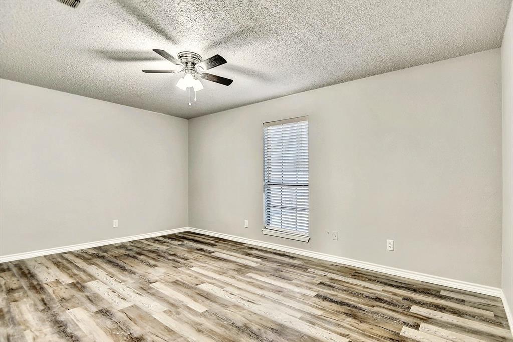 925 Farmington Road Howe, TX 75459 - Photo 10 of 14 a view of an empty room with a window