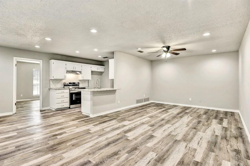 925 Farmington Road Howe, TX 75459 - Photo 14 of 14 a view of kitchen with wooden floor