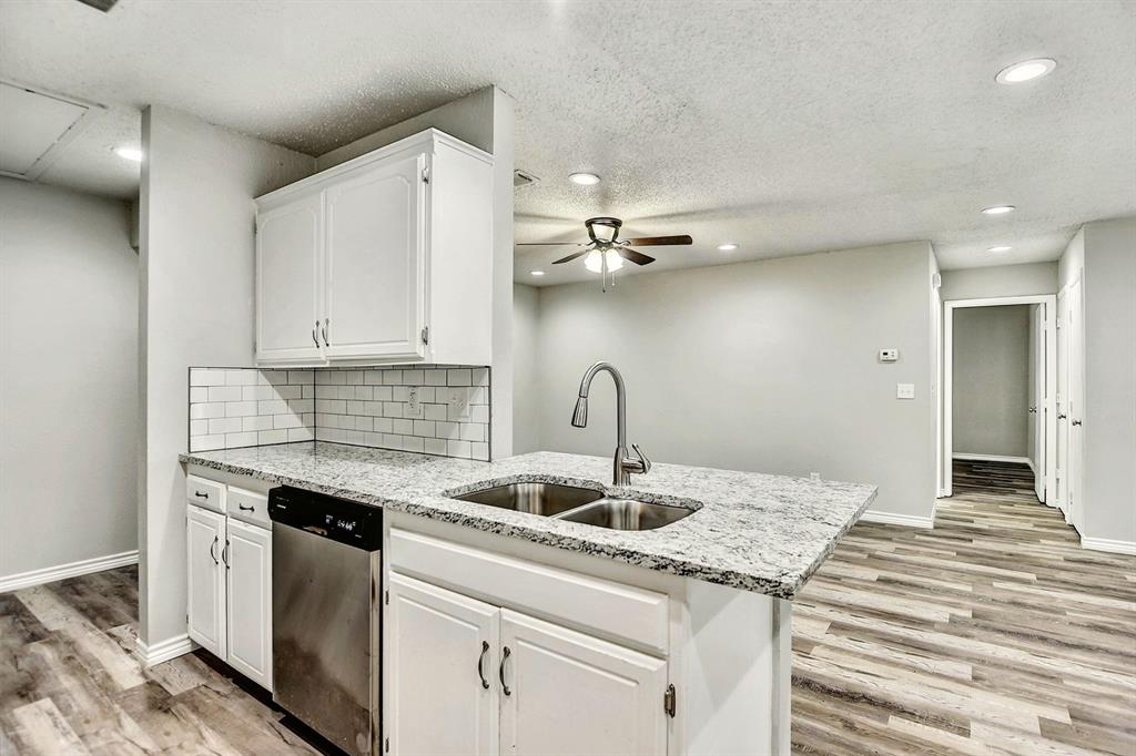925 Farmington Road Howe, TX 75459 - Photo 5 of 14 a kitchen with a sink cabinets and appliances