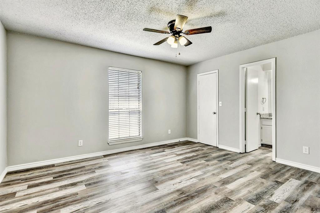 925 Farmington Road Howe, TX 75459 - Photo 8 of 14 a view of an empty room with a window