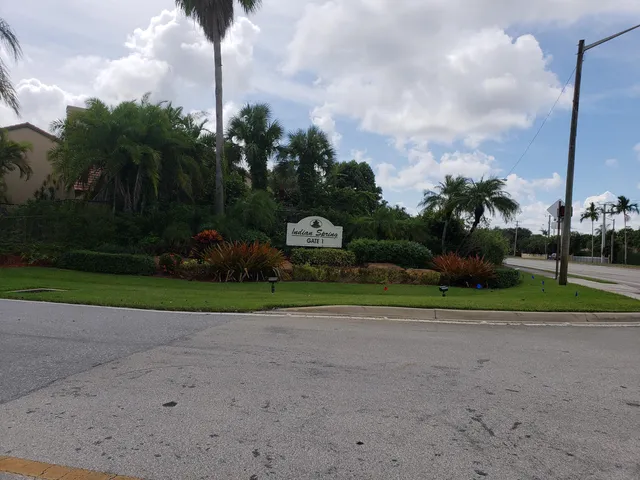 a small garden in the middle of a yard