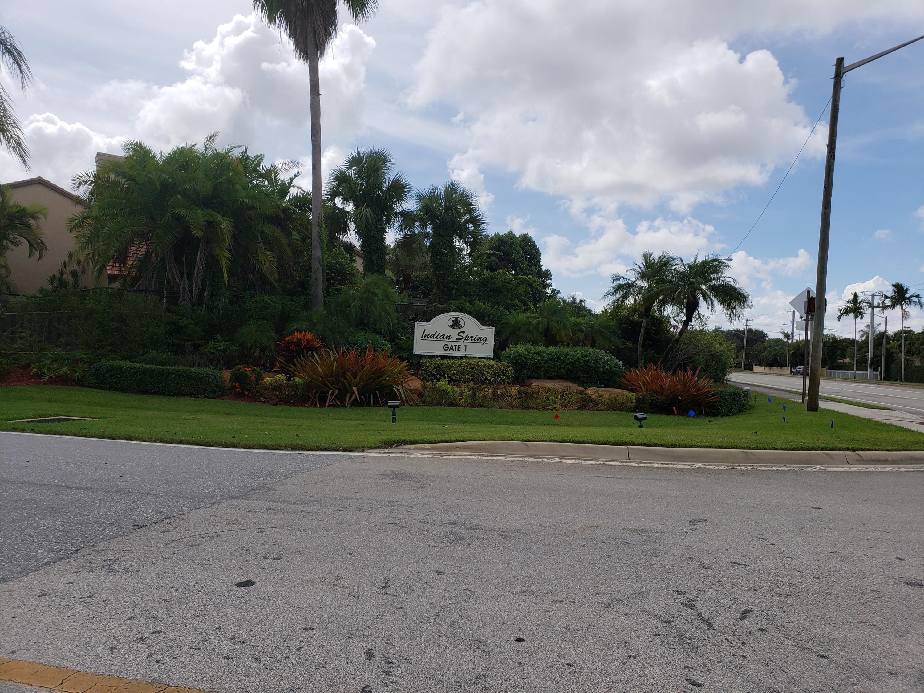 11115 Oakdale Road Boynton Beach, FL 33437 - Photo 4 of 30 a small garden in the middle of a yard