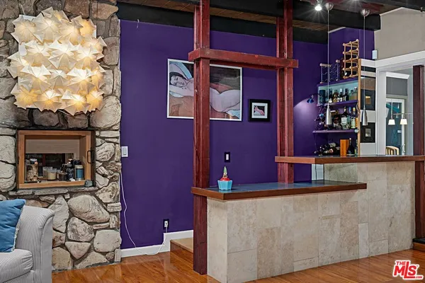 a room with furniture and a book shelf