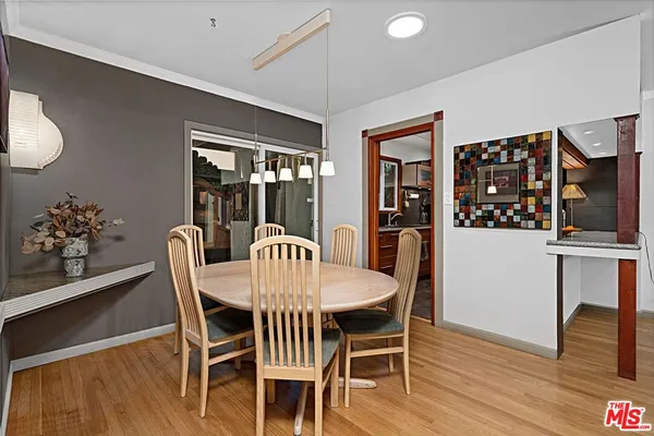 a view of a patio with a table chairs and a patio
