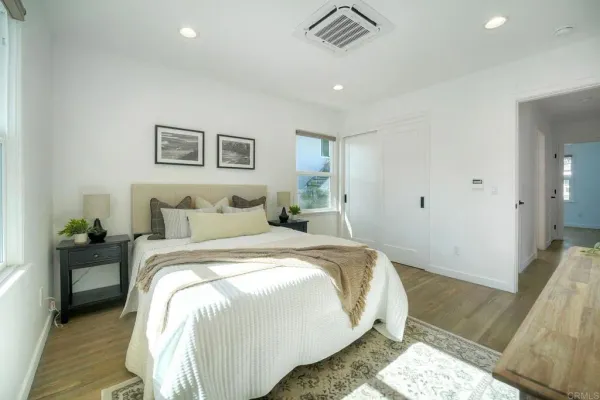 a bed room with a bed and a couch