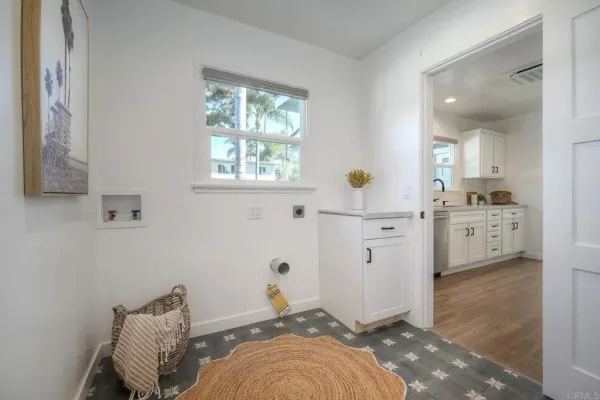 a living room with furniture and window
