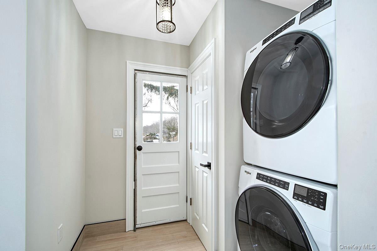 145 Harrison Avenue Harrison, NY 10528 - Photo 11 of 26 Door to the Backyard. Laundry and Powder Room