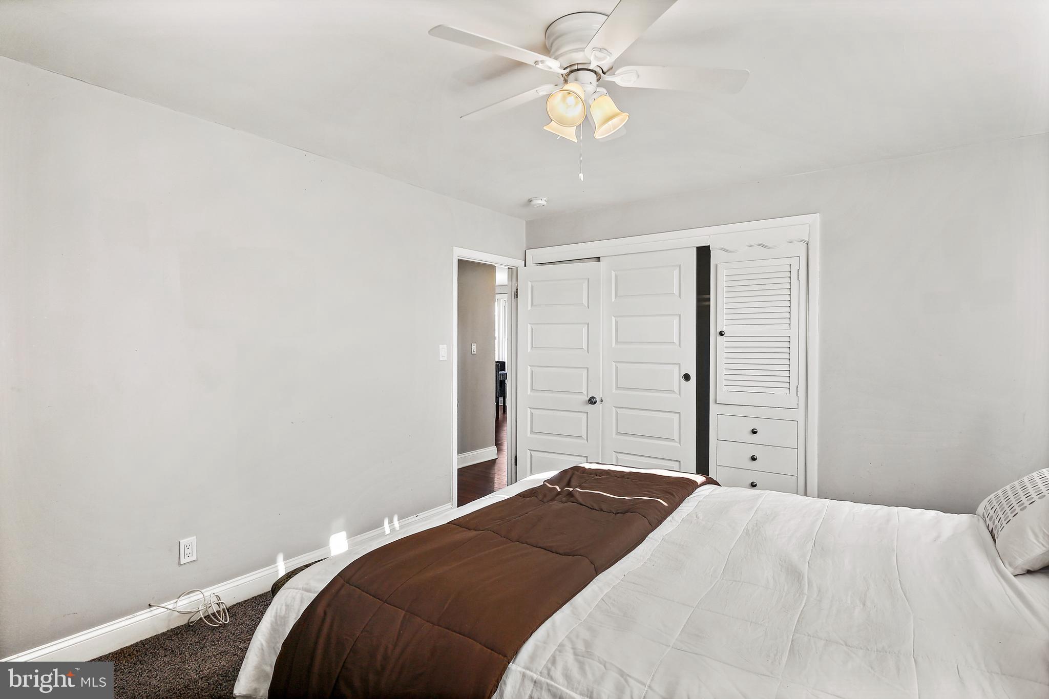 1607 Burnfield Road Rosedale, MD 21237 - Photo 14 of 34 Carpet & ceiling fan