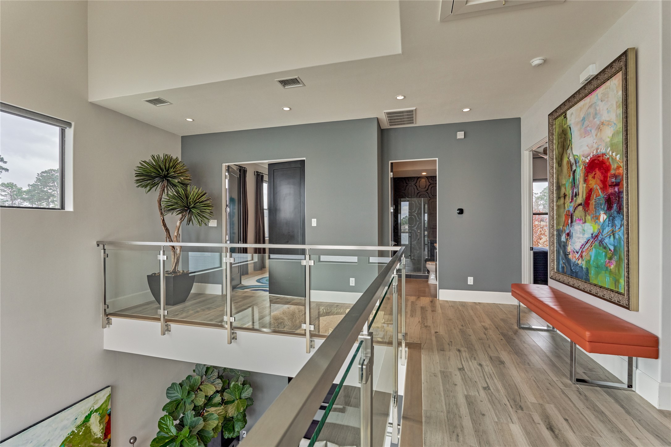 189 Stevinstraat Montgomery, TX 77356 - Photo 26 of 50 a view of a hallway with wooden floor and staircase