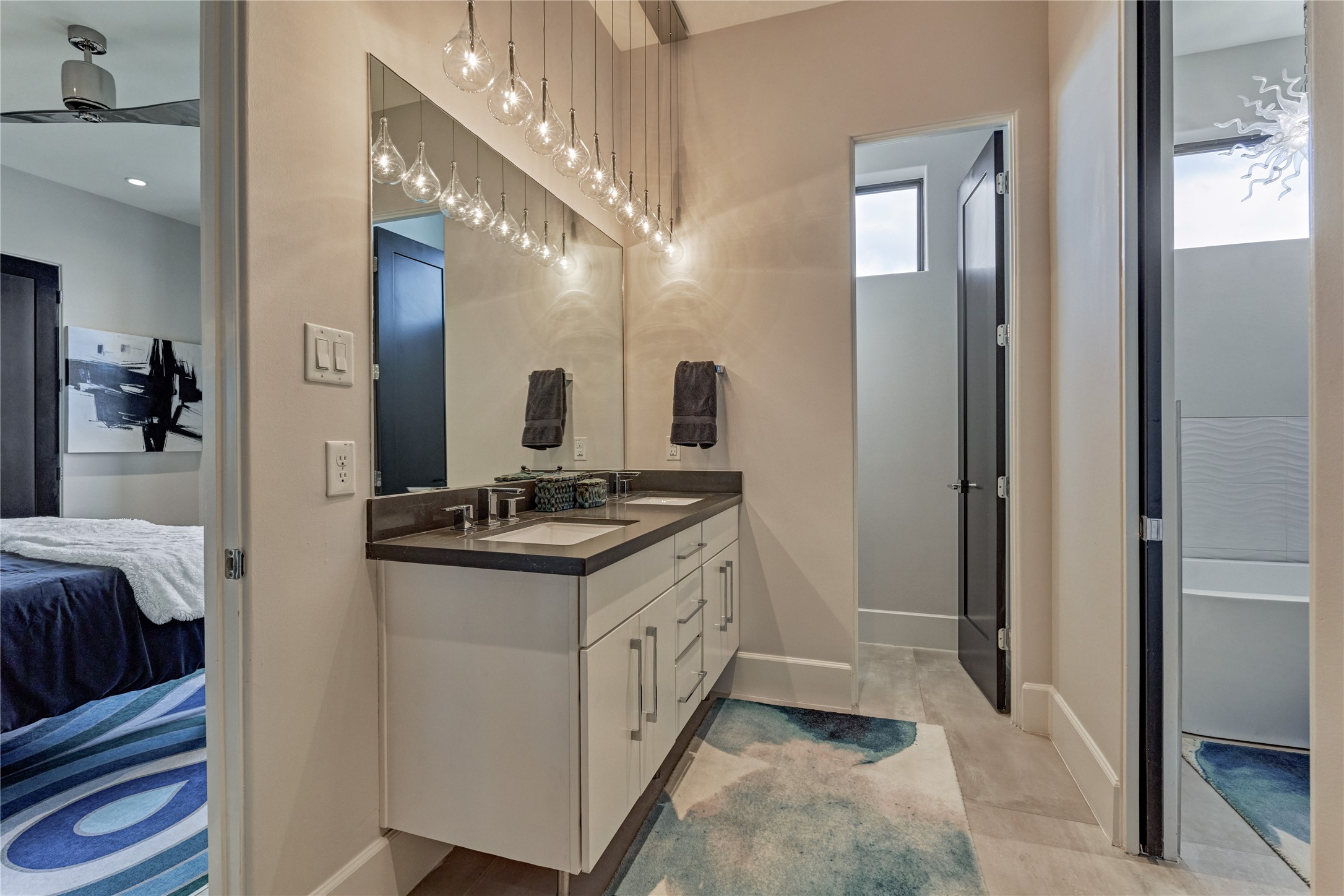 189 Stevinstraat Montgomery, TX 77356 - Photo 28 of 50 a spacious bathroom with a granite countertop double vanity and a mirror