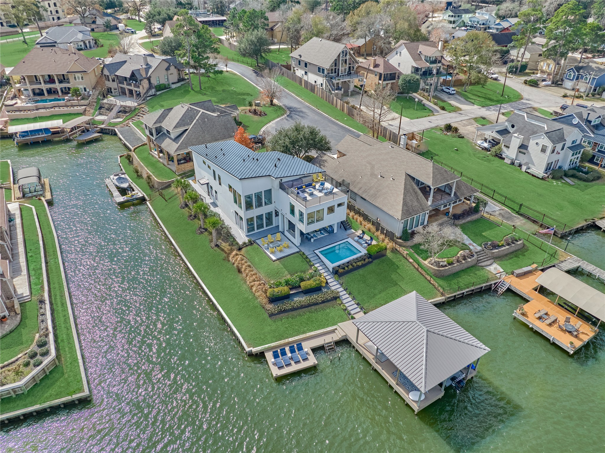 189 Stevinstraat Montgomery, TX 77356 - Photo 4 of 50 an aerial view of a house with a garden and lake view