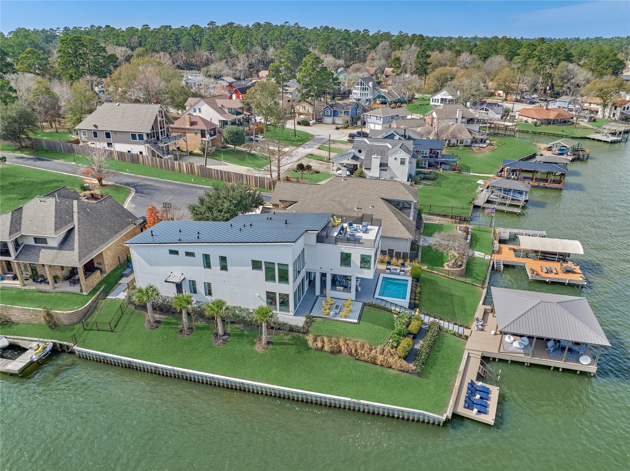 189 Stevinstraat Montgomery, TX 77356 - Photo 48 of 50 an aerial view of a house with a garden and lake view