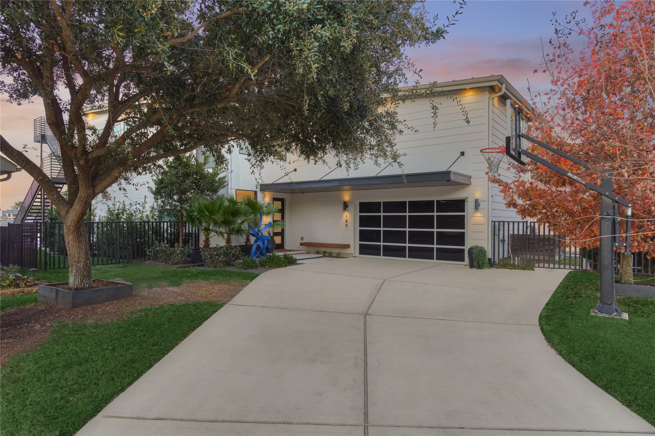 189 Stevinstraat Montgomery, TX 77356 - Photo 5 of 50 a front view of a house with a yard and garage