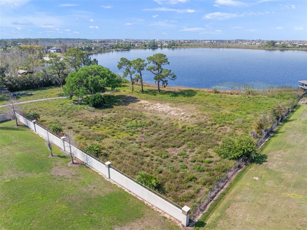 8750 Seidel Road Winter Garden, FL 34787 - Photo 4 of 17 a view of a lake with a mountain in the background