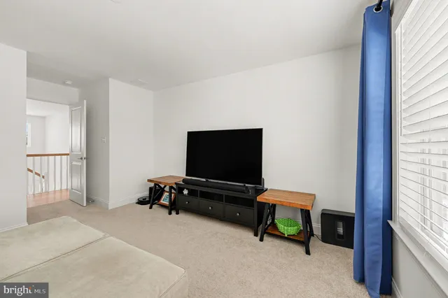 a view of a workspace with furniture