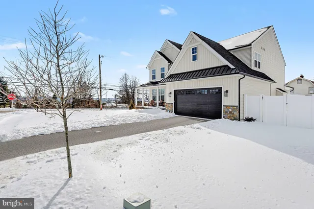 a view of a balcony with furniture and floor to ceiling window