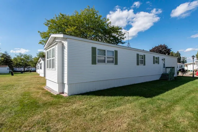 a view of a backyard with a garden