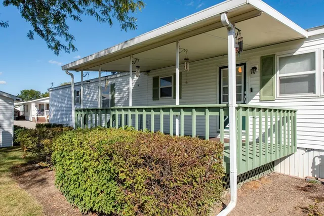 front view of a house with a small yard