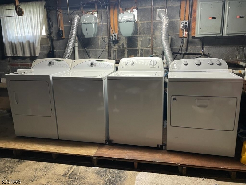 28 Boyd Street, Unit 2 Lodi, NJ 07644 - Photo 9 of 9 a utility room with dryer and washer
