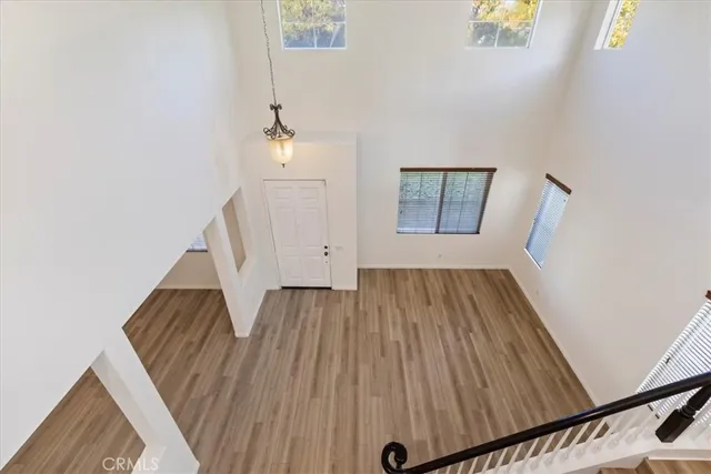 a view of front door with wooden floor