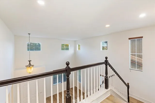 a bathroom with a sink a vanity and a window
