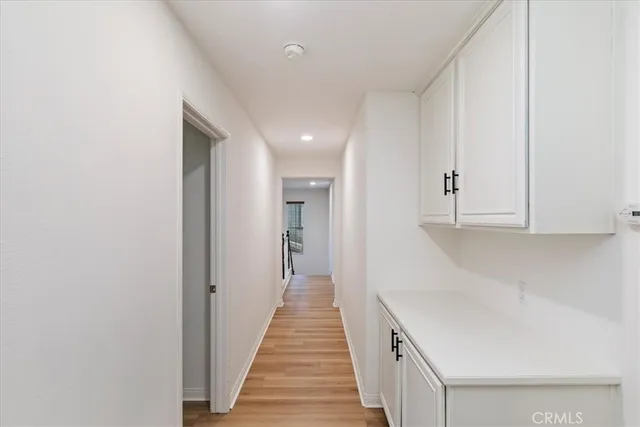 a bathroom with a sink and a window