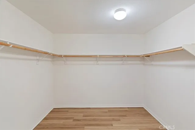 a front view of a residential apartment building with a yard