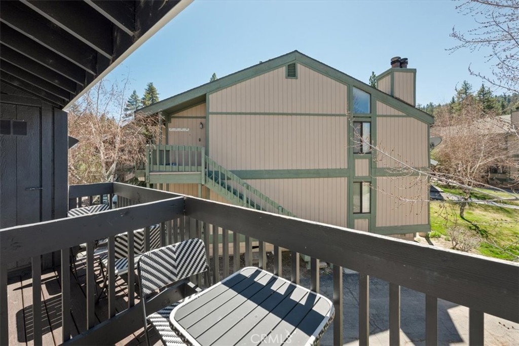 760 Bluejay Road, Unit 26 Big Bear Lake, CA 92315 - Photo 24 of 35 a view of balcony with wooden floor