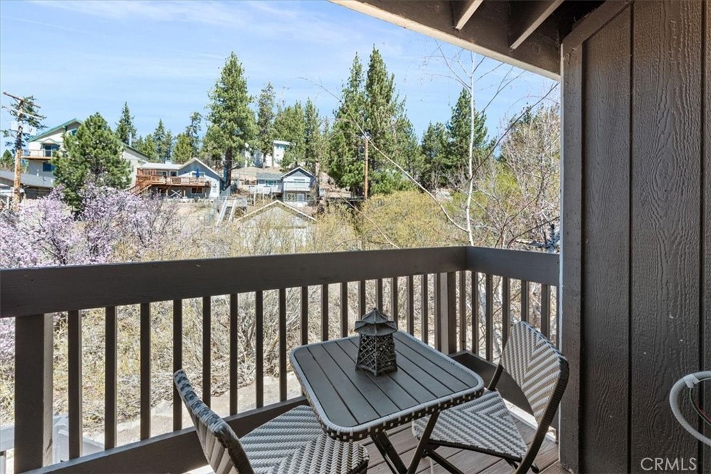 760 Bluejay Road, Unit 26 Big Bear Lake, CA 92315 - Photo 33 of 35 a view of a chairs and table in patio