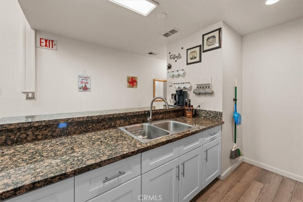 760 Bluejay Road, Unit 26 Big Bear Lake, CA 92315 - Photo 10 of 35 a kitchen with sink and cabinets